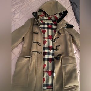 Size 4 (small) Burberry trench coat.